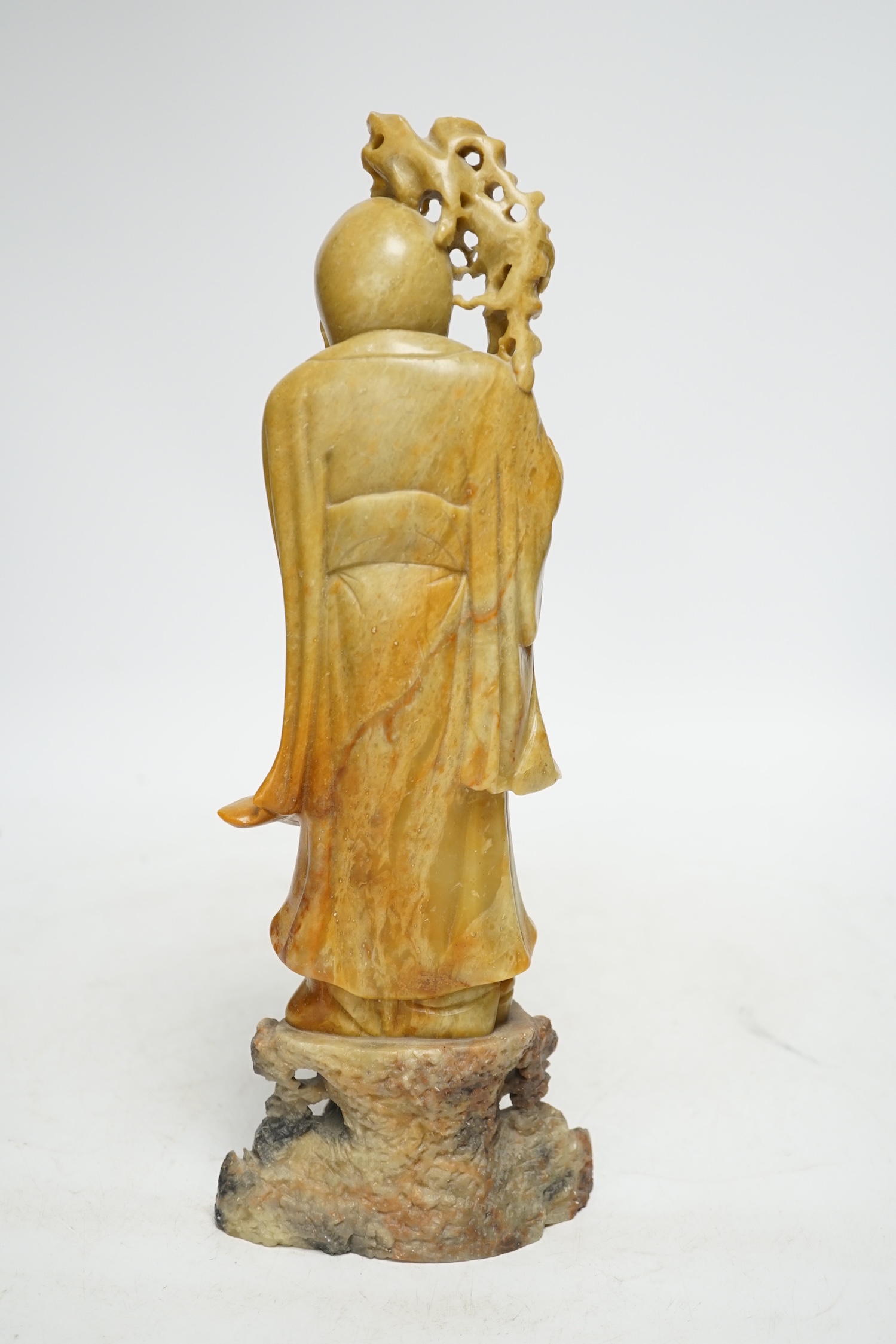 A Chinese soapstone standing figure of Shou Lao, 30cm. Condition - good.